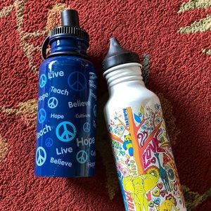 Two Girl Scout water bottles